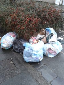 Fly tipped rubbish sacks